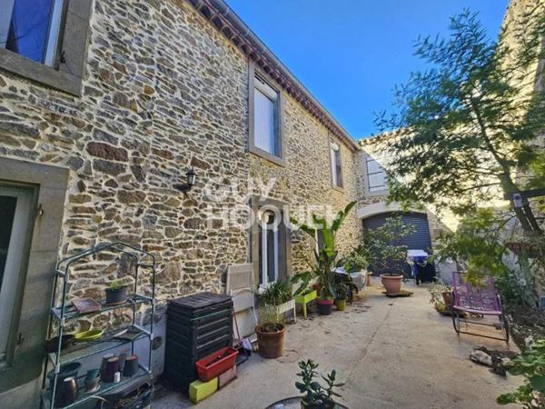 Maison de village en pierre 170m² avec garage et cour