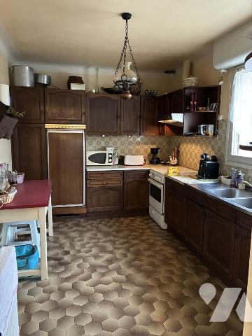 Maison d'habitation avec jardin attenant