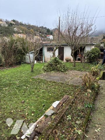 Maison d'habitation avec jardin attenant