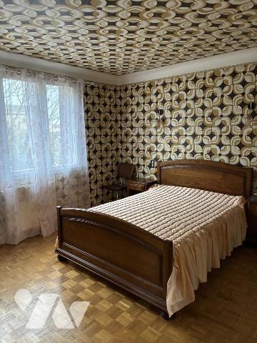 Maison d'habitation avec jardin attenant