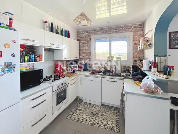 A vendre immeuble / maison Malemort divisée en deux appartements - Un T5 et un T3 - 2 garages- jardin