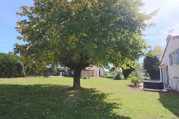 Maison 2 chambres avec garage et atelier sur terrain de 1700m2