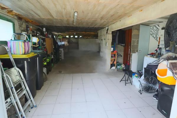 Maison 2 chambres avec garage et atelier sur terrain de 1700m2