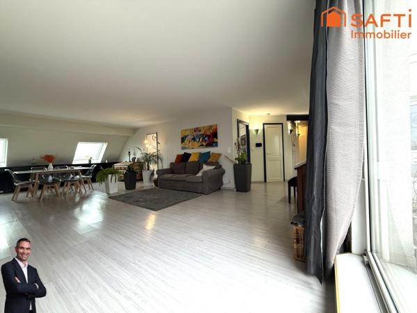 Superbe appartement de 3 pièces en attique disposant de deux terrasses, d'une cave, d'une place de stationnement privée et d'un garage !