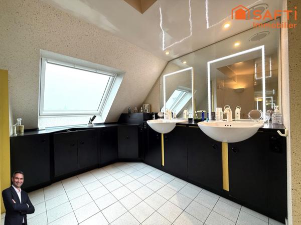 Superbe appartement de 3 pièces en attique disposant de deux terrasses, d'une cave, d'une place de stationnement privée et d'un garage !