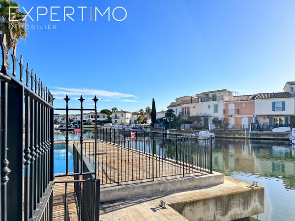 Aigues-Mortes (30220) Marina de Type T4, place de parking, garage, appontement .