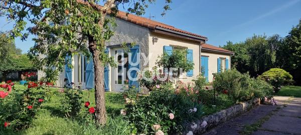 Grande maison avec parc et dépendances