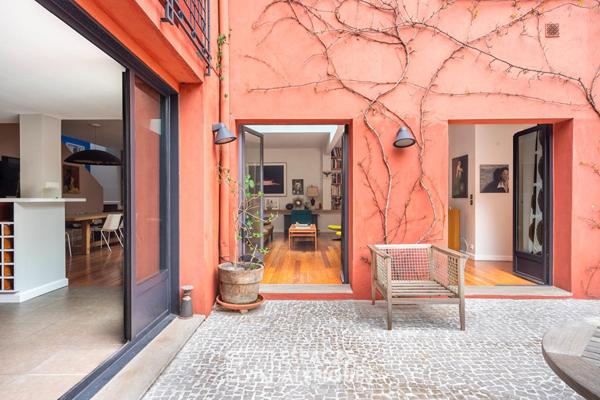 Maison à l’esprit loft avec cour