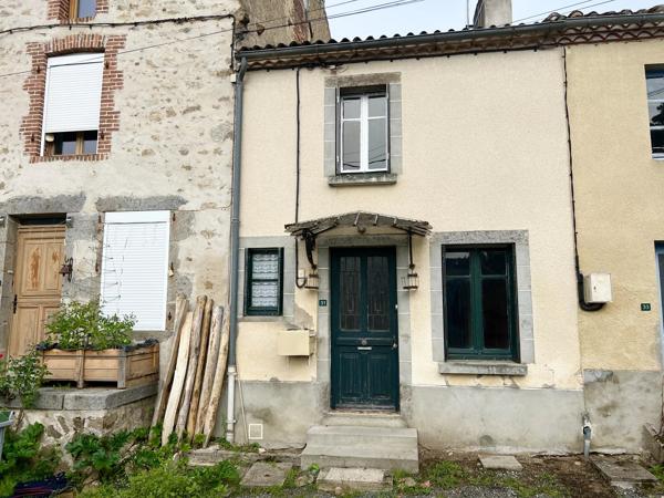 Maison mitoyenne avec une ou deux chambres et jardin