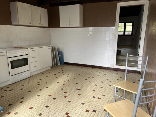 Maison mitoyenne avec une ou deux chambres et jardin