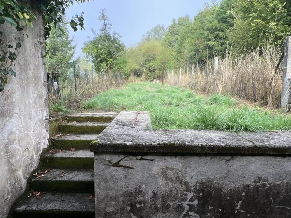 Maison mitoyenne avec une ou deux chambres et jardin