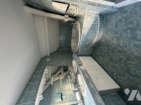 Maison de ville, sur trois niveaux