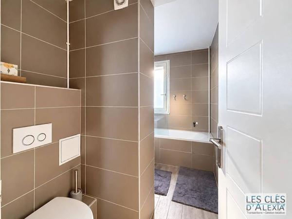 T3 - VILLEURBANNE - TRAVERSANT DE 58,31 M² – VUE DÉGAGÉE - AVEC CAVE ET PARKING