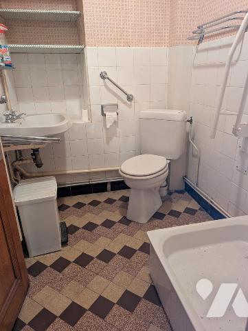 Immeuble composé de 3 appartements + caves en sous-sol 