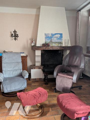 Immeuble composé de 3 appartements + caves en sous-sol 