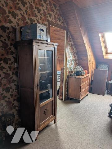 Immeuble composé de 3 appartements + caves en sous-sol 