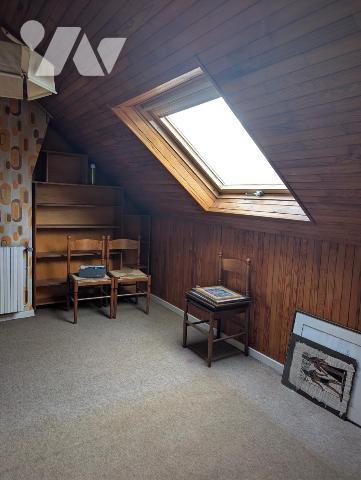 Immeuble composé de 3 appartements + caves en sous-sol 