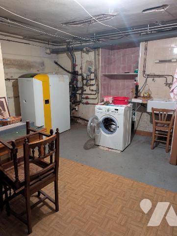 Immeuble composé de 3 appartements + caves en sous-sol 