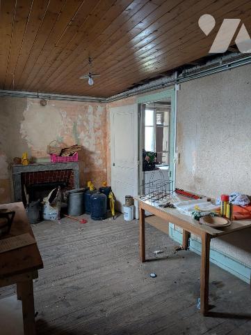 Immeuble composé de 3 appartements + caves en sous-sol 