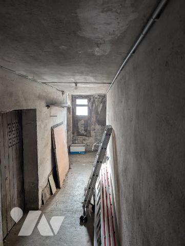 Immeuble composé de 3 appartements + caves en sous-sol 