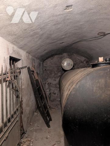 Immeuble composé de 3 appartements + caves en sous-sol 