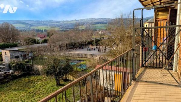 Immeuble composé de 3 appartements + caves en sous-sol 