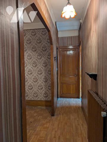 Immeuble composé de 3 appartements + caves en sous-sol 