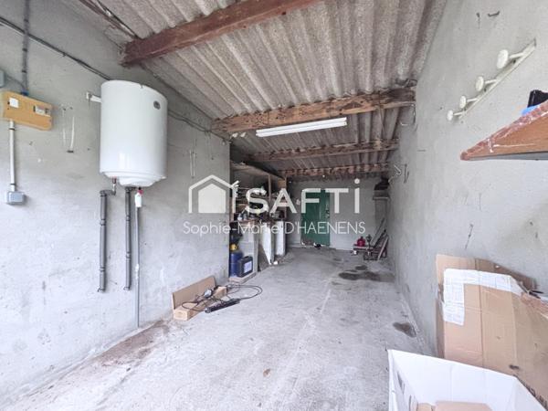 Maison de plain-pied au calme avec jardin et garage