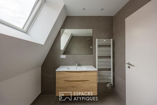 Loft contemporain en duplex et sa terrasse dans une ancienne friche industrielle