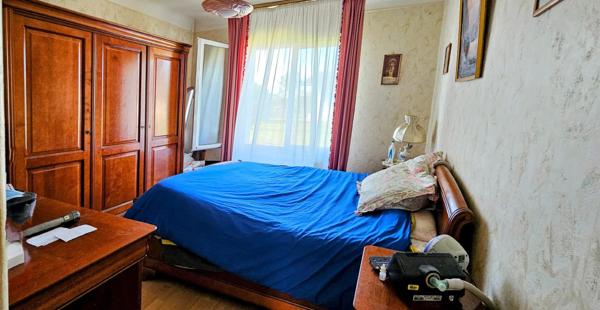 Maison lumineuse avec double garage et sa véranda