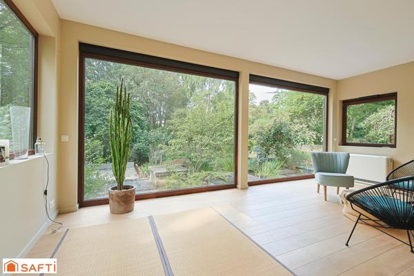 Propriété nichée au sein d'un parc arboré de 5565 m2