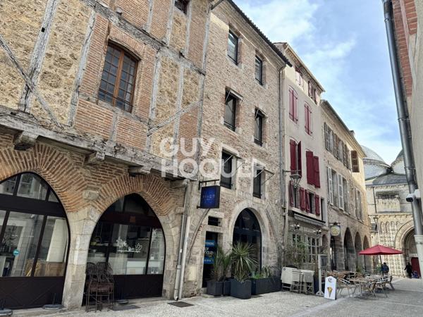 Local commercial + Habitation