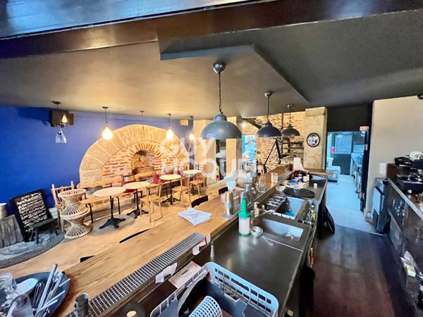 Local commercial + Habitation