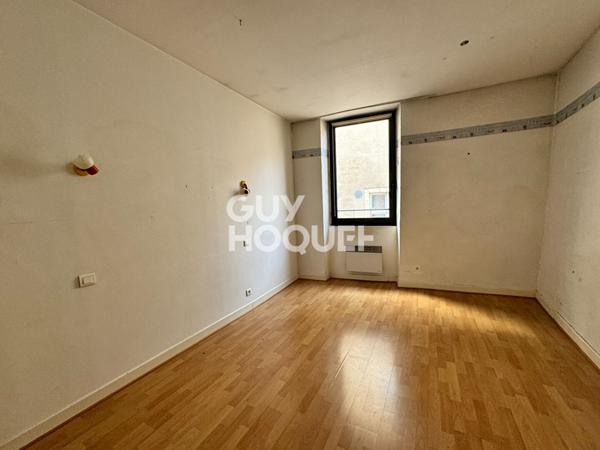 Local commercial + Habitation