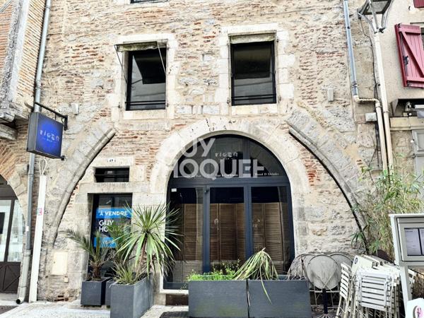 Local commercial + Habitation