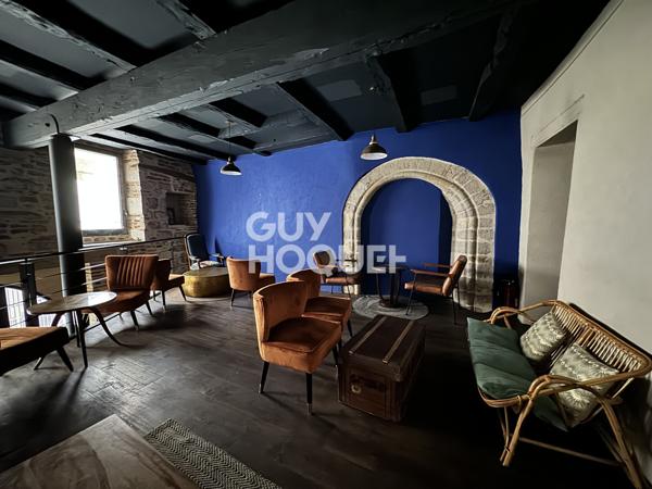 Local commercial + Habitation