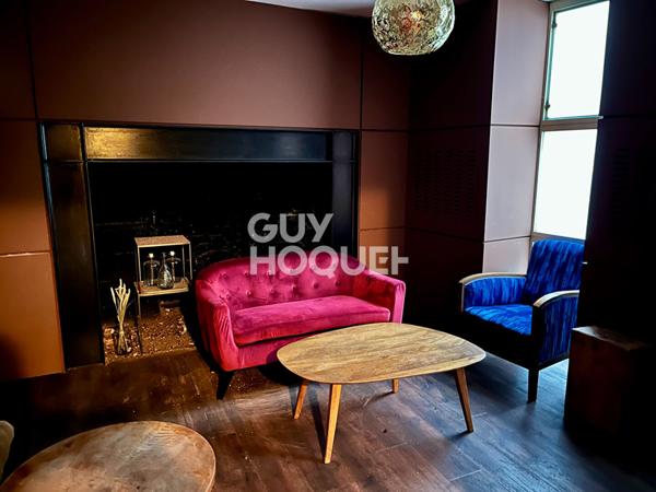 Local commercial + Habitation