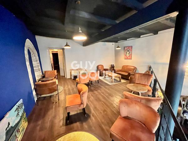 Local commercial + Habitation