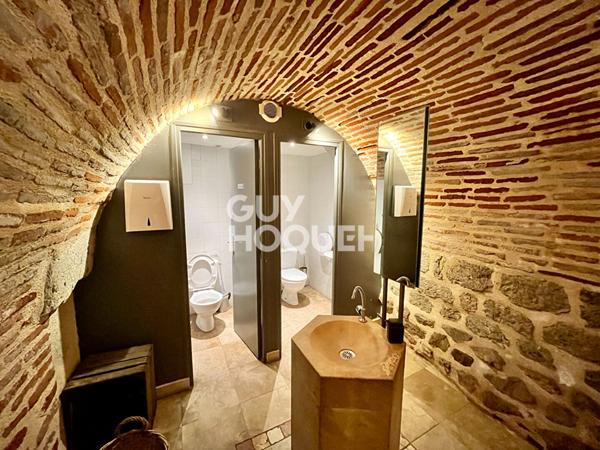 Local commercial + Habitation