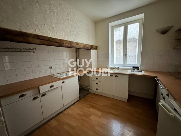 Local commercial + Habitation