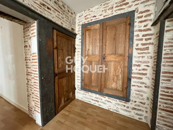 Local commercial + Habitation