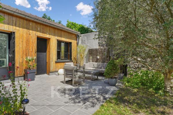 Maison type loft de plain-pied avec jardin