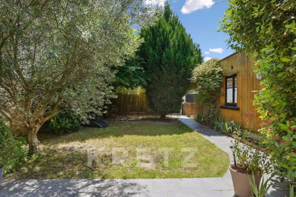 Maison type loft de plain-pied avec jardin