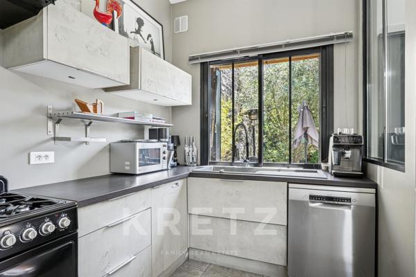 Maison type loft de plain-pied avec jardin