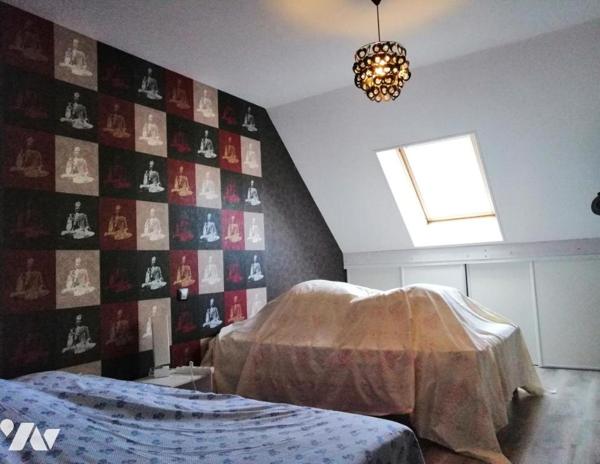 Maison mitoyenne avec dépendance centre PONTORSON.