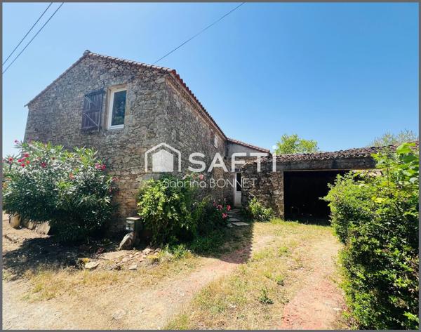 Maison en pierre de 105m² d'habitation et 90 m² supplémentaires à créer.