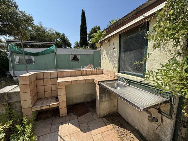 Mobilhome à rénover sur terrain de 210 m2 environ