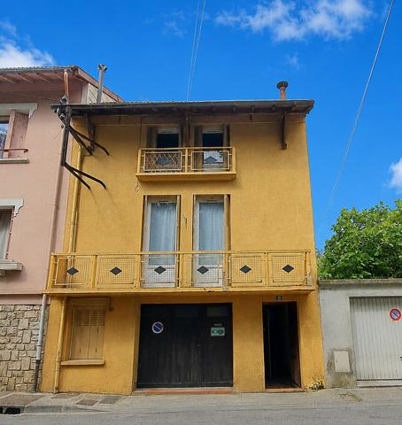 A VENDRE MAISON DE VILLE AVEC GARAGE ET JARDIN