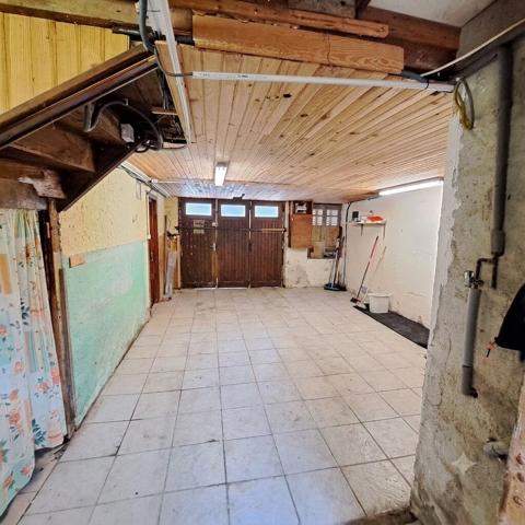 A VENDRE MAISON DE VILLE AVEC GARAGE ET JARDIN