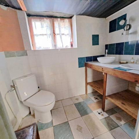 A VENDRE MAISON DE VILLE AVEC GARAGE ET JARDIN